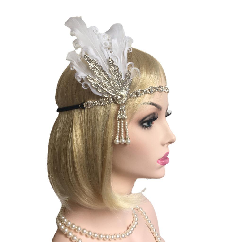 Cocar vintage de penas e strass para festa étnica ou palco