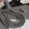 Collier de Perles de Verre pour Femmes, Convient pour l'Automne et l'Hiver, avec une Chaîne pour Pull, Un Élégant Collier de Perles pour le Cou.