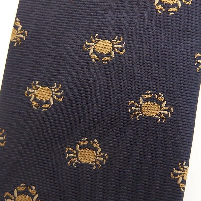 A Unique Tie Featuring a Row of [CUFFSMANIA] Fun, Crabs.