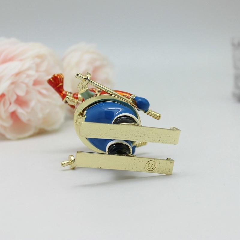 Nový vánoční dárek Smaltovaná barva Lyžující sněhulák Kreativní malé ozdoby Úložný box Stolní malé ozdoby