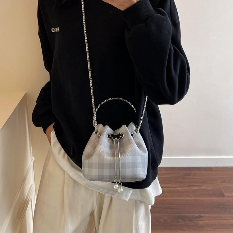Karomuster Tasche Damen Sommer neue Mode Nische Kette Umhängetasche Kordelzug plissierte Bucket Bag