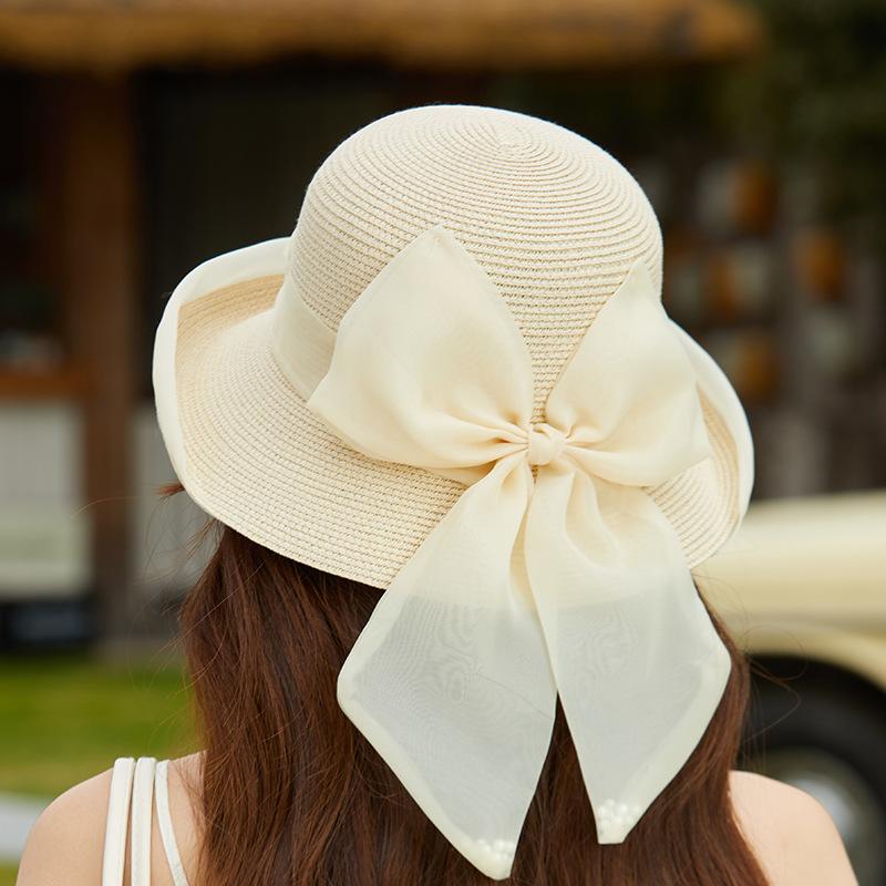 Spring and summer new women's straw hat big bow decorative sunscreen visor basin hat showing face small seaside vacation photo hat
