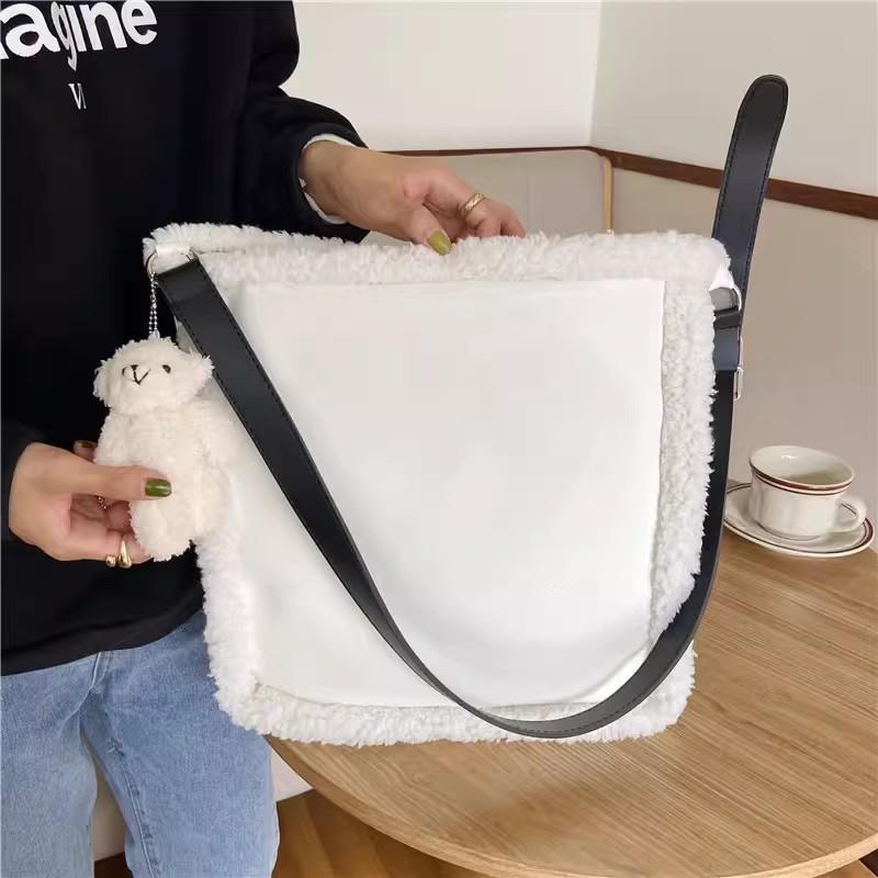 

Chic White Plush Shoulder Bag For Women With Elegant Design Ideal For Commuting And Daily Outings White Crossbody