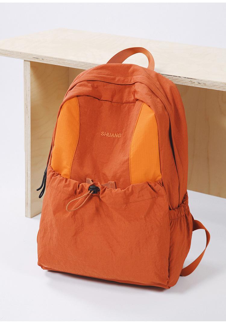 

Solid Color Lightweight Backpack for Outdoor Leisure Travel, Large Capacity Waterproof Backpack for Both Men and Women помаранчевий