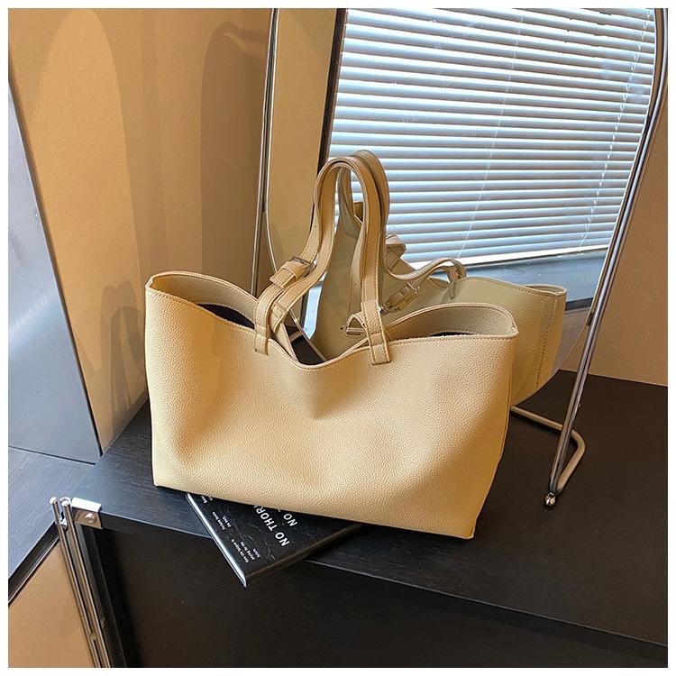 Einfache und vielseitige Tasche Damen große Kapazität neue Sommer Freizeit Schultertasche strukturierte Pendler Tragetasche