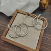 Doudou Mosquito Coil Ear Clip Earrings: Retro Light Luxury, Trendy 2023 All-Match Metal Style.