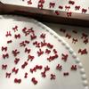 100 Stück 3D Nail Art Rote Schleifen Anhänger Kawaii Harz Zubehör für Maniküre Dekorationen 10 Stück pro Set Nail Art Zubehör