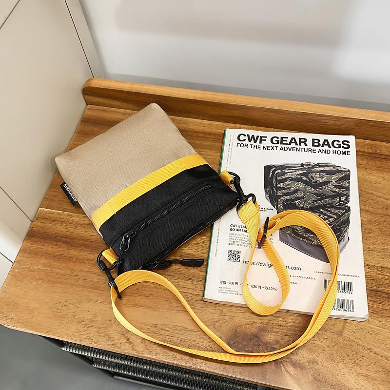 Korean casual trend messenger bag women's summer fashion sports portable Oxford cloth mobile phone bag versatile