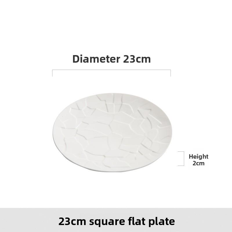 Piatto piano e piatto rotondo in ceramica sottosmalto bianco di design di alta gamma goffrato, un nuovo tipo di piatto da cucina casalinga