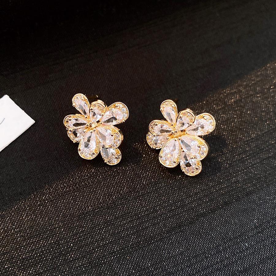Water drop zircon flower stud earrings super flash niche European and American personalized design earrings earrings women