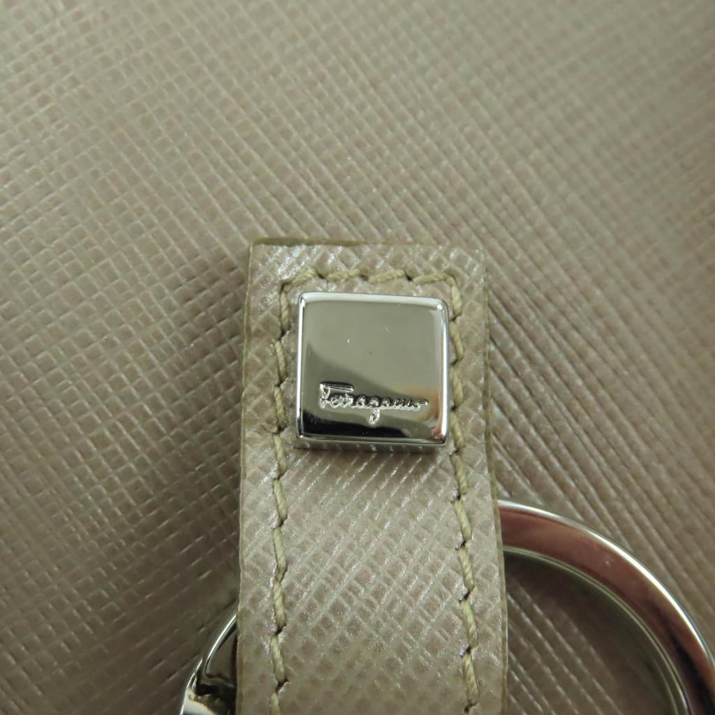 Excellent Porte-clés Salvatore Ferragamo Cuir Doré Champagne Femme 224627 Occasion