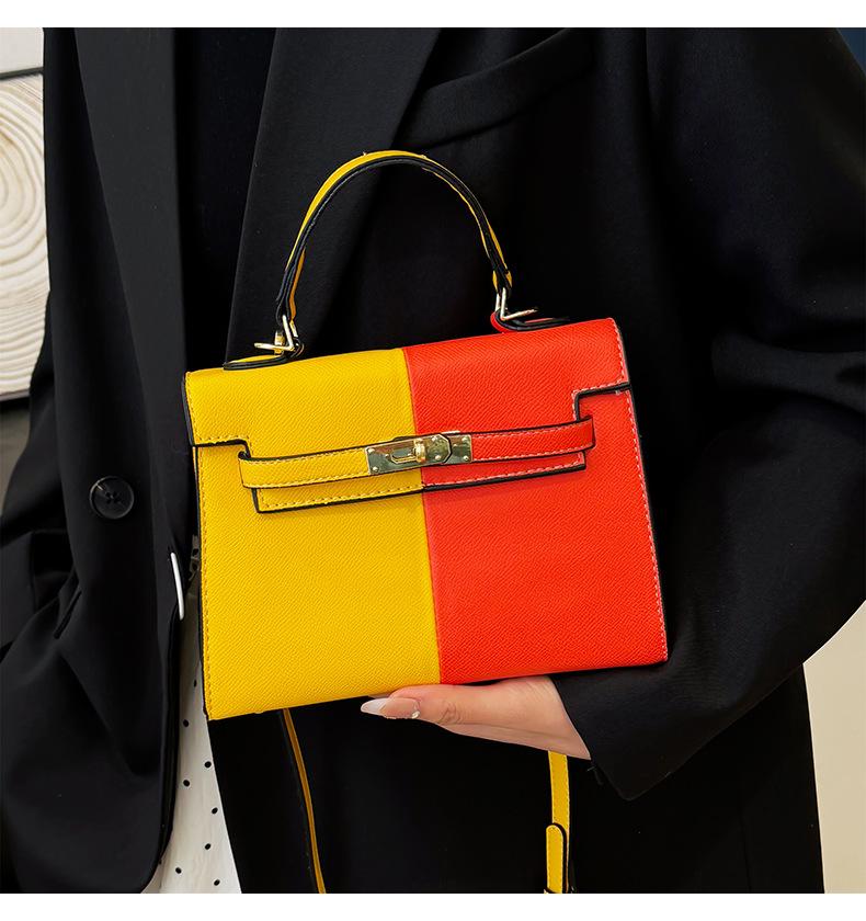 Color Block Kelly Bag: Trendy Two-Tone, Large Capacity, Versatile Shoulder & Crossbody Bag for Work Commute.