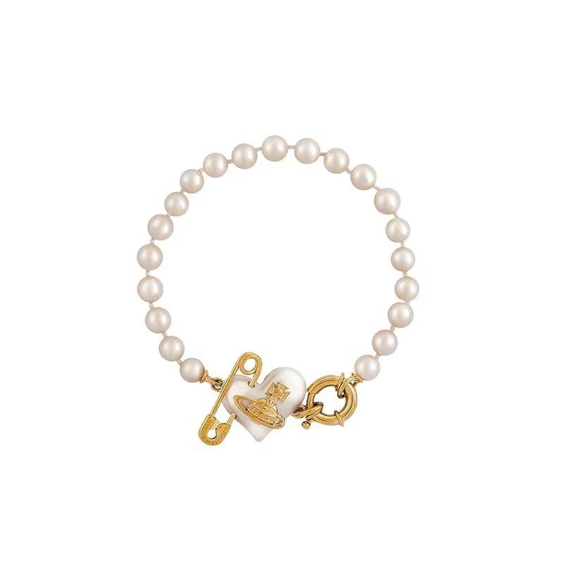 

Empress Dowager Pearl Saturn Bracelet: Elegant Women s Luxury Brooch золотий