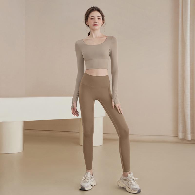 2025 Women's Spring Long-Sleeve Yoga Top with Chest Pads for Professional Fitness and Pilates