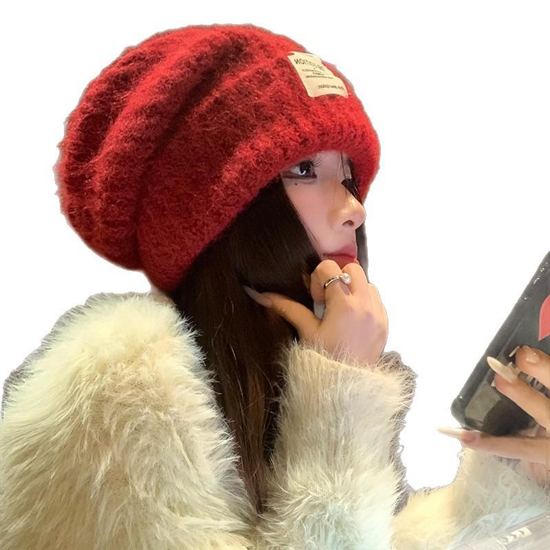 Chapeau de laine coréen doux et mignon à grosse tête Automne et hiver Décontracté Polyvalent Chapeau de tête Coupe-vent Oreilles chaudes Chapeau tricoté