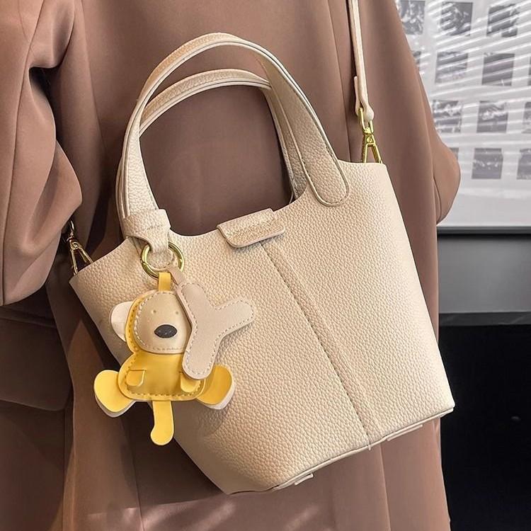 Premium sense bag women's 2025 spring new fashion work handbag solid color texture versatile messenger bucket bag