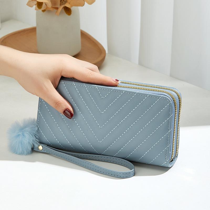 Women's long double-layer wallet, new oblique pattern embroidery hairball decoration, hand-held change bag, casual bag, one generation