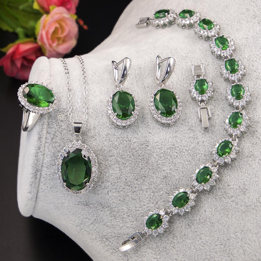 Conjunto de brincos e colar Conjunto de joias Conjunto oval cercado de zircônia Conjunto de brincos de Natal com corrente