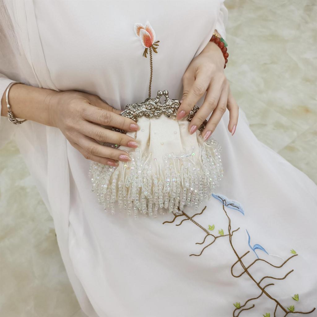Pochette da sera di lusso con nappe di perline e paillettes con catenina in raso
