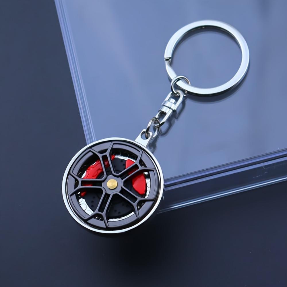 Metallbremsradnabe drehen integrierte Pistole schwarzer Schlüsselanhänger Weihnachtsgeschenk Mercedes-Benz Radnaben-Bremssattel-Schlüsselanhänger