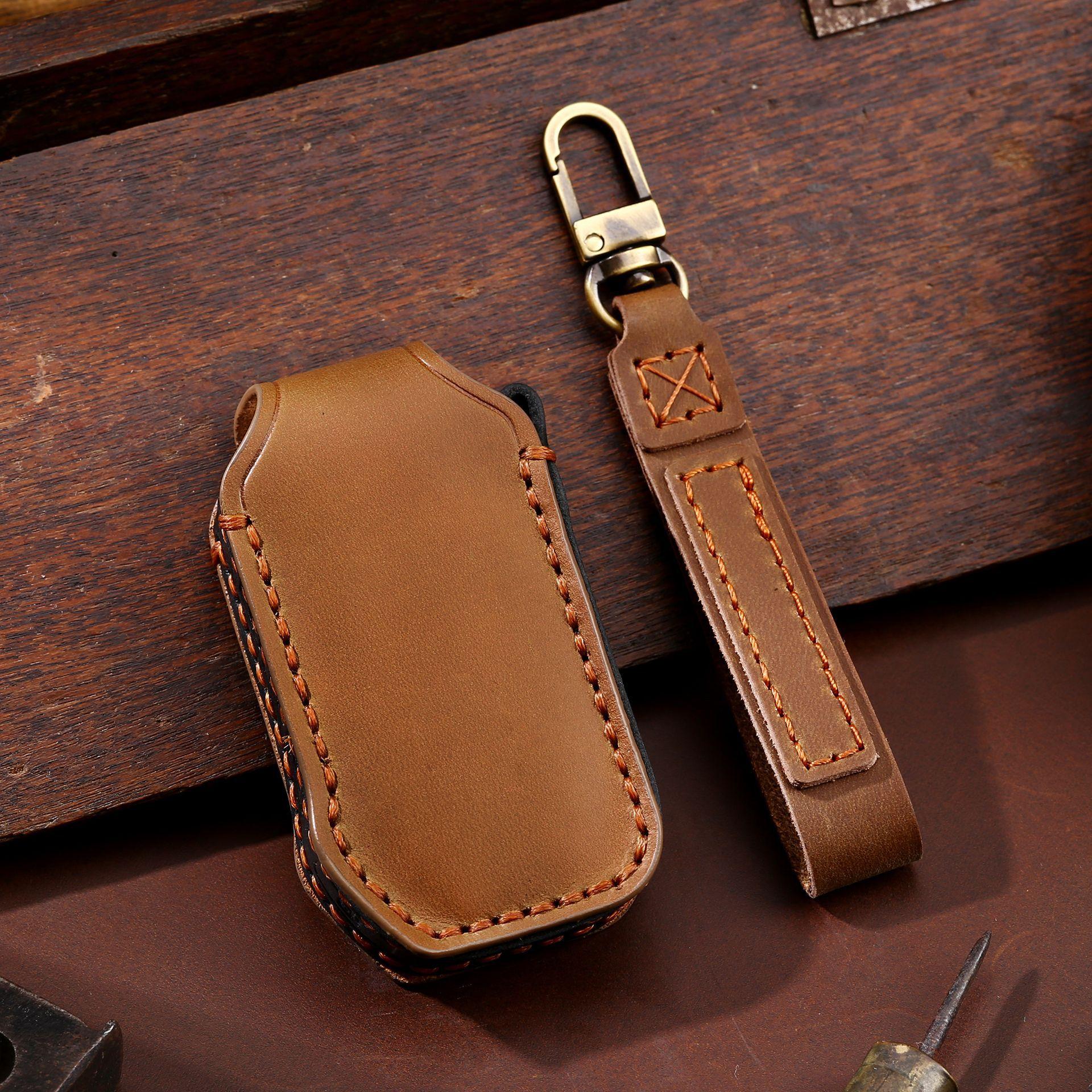 

Car key cover is suitable for Korean Kia Smart Run key cover, Lion Run genuine leather protective case, cowhide key bag. коричневый