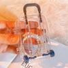 Creative Mini Luggage Storage Box for Wedding Candy, Nail Art Accessories, and Toys - Transparent Small Box.