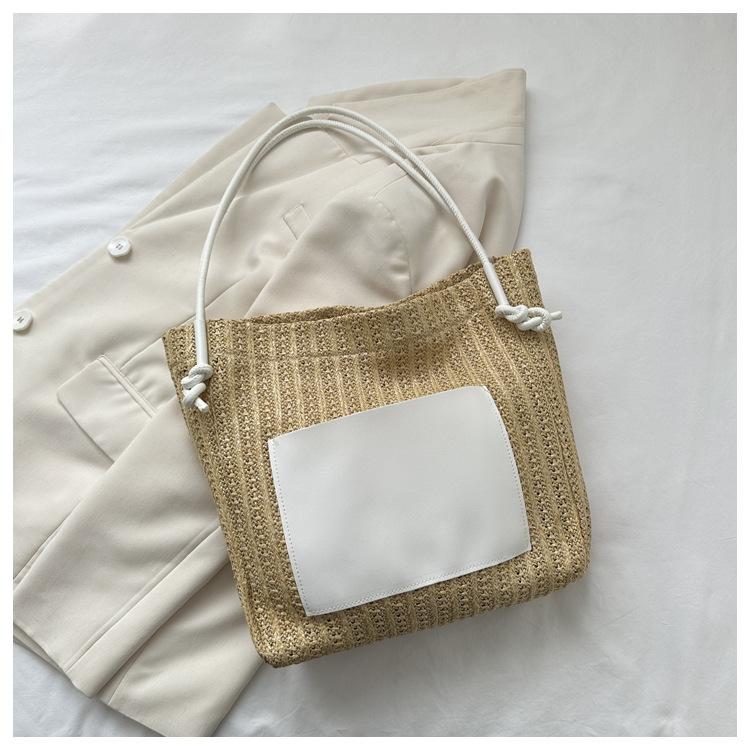 Summer straw bag women's 2025 new large-capacity woven shoulder bag high-end texture niche commuter tote bag