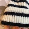 Hat women's season black and white striped versatile wool hat trendy warm knitted couple Korean version Japanese hat factory