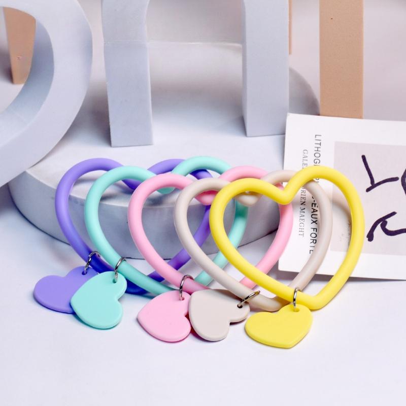 1 szt. Silikonowa bransoletka w kształcie serca, smycz do telefonu komórkowego, przenośny uchwyt na brelok zapobiegający zgubieniu, sznurek na nadgarstek chroniący telefon komórkowy przed upadkiem