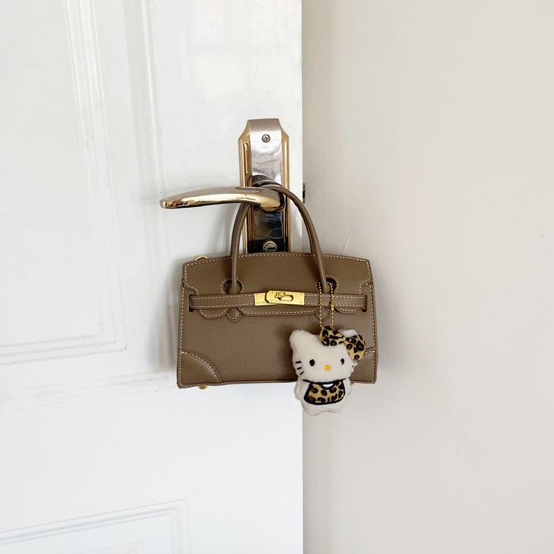 Sac à main de mode haut de gamme Automne/Hiver 2025: Sac bandoulière simple et polyvalent à fermeture à loquet pour femmes