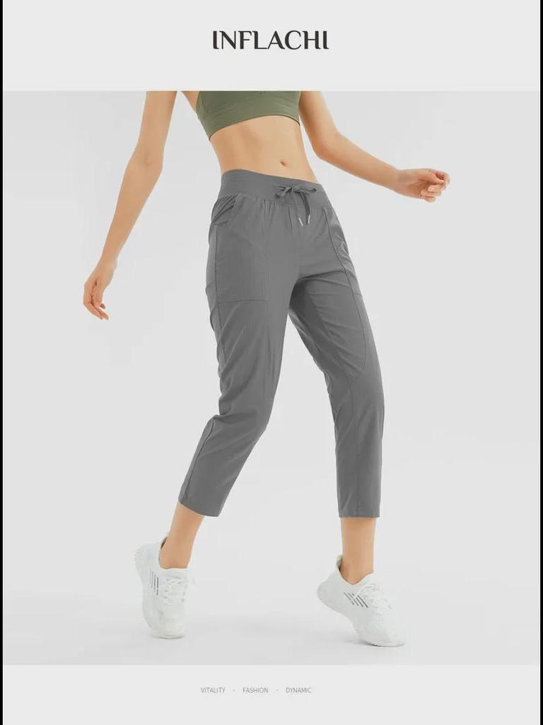 Women's Quick-Dry Yoga Pants: Breathable, Loose-Fit, Nine-Point Length with Drawstring for Running and Fitness.