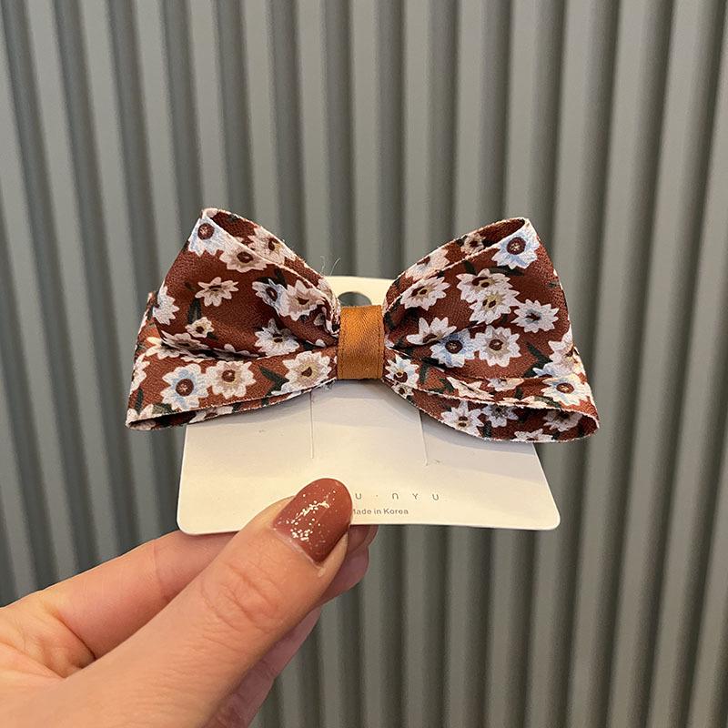 

Korean Floral Daisy Bow Headwear in Caramel - Girls Accessories