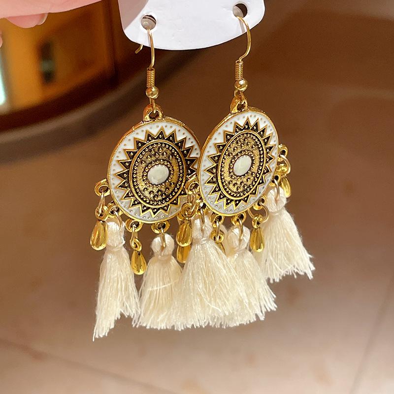 Boho náušnice s třásněmi z peří: Unikátní tkané dlouhé visací doplňky pro ženy