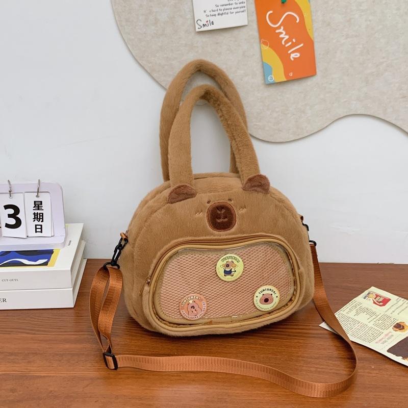 

Cute capybara plush bag, puff grain bag, portable messenger bag, women s lightweight shoulder bag No accessories. темно-коричневого