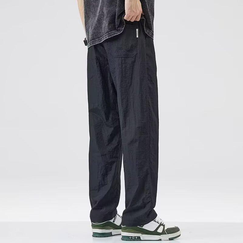 

Ice silk quick-drying pants men s loose straight trendy brand wide-leg sports 2025 new summer thin casual trousers M чорний