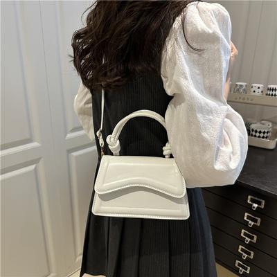 Mode Nischendesign Tasche Damen Frühling und Sommer neue Damentasche einfarbig lässige Handtasche einzelne Schulter Umhängetasche Tide