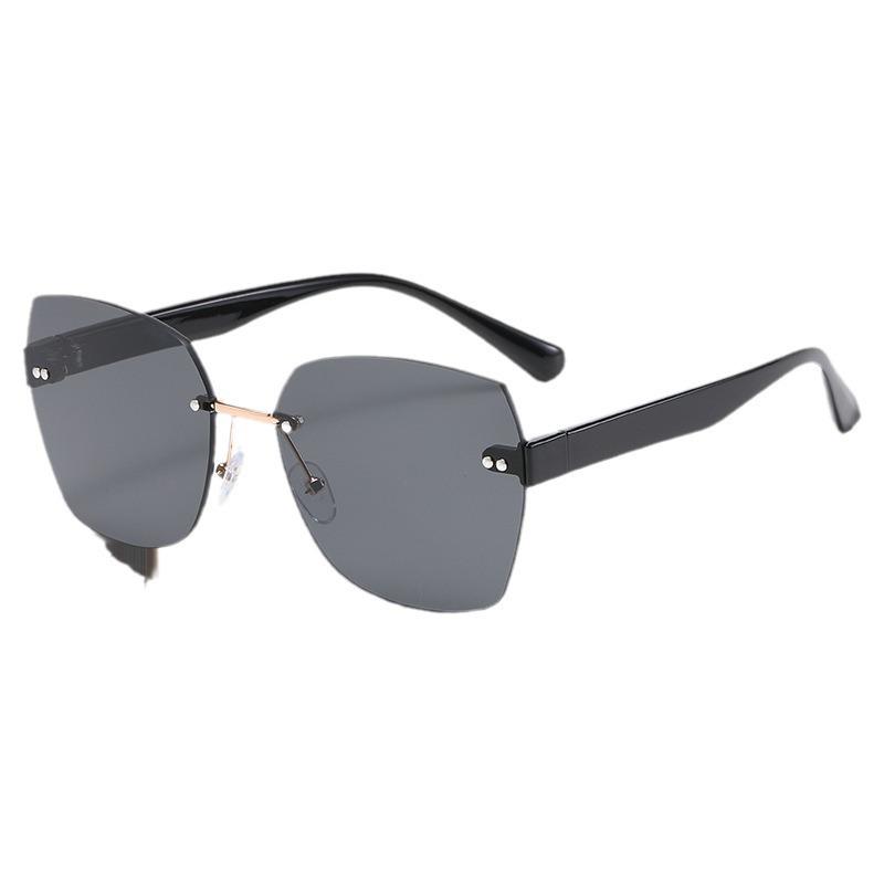 Trendy Women's Frameless Luxury Sunglasses - Fashionable Retro European & American Sunshades with Sunscreen Protection.