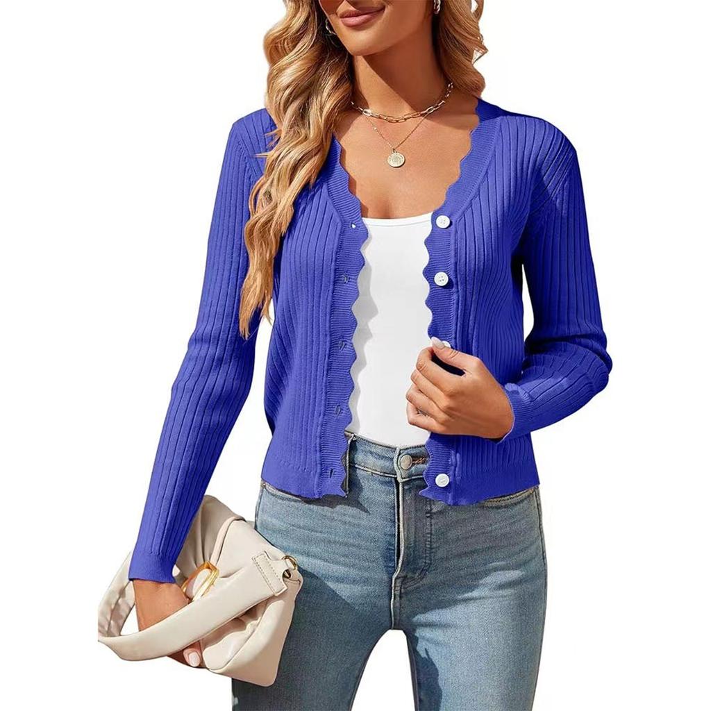 Damkofta i enfärgad avslappnad stil med vågkant, V-ringning, tunn kort stickad jacka