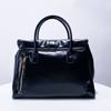 Luxury Women's Briefcase Designer Bag and Bag New In PU Leather Vintage Simple Large Capacity Lock Displacement Lady Tote