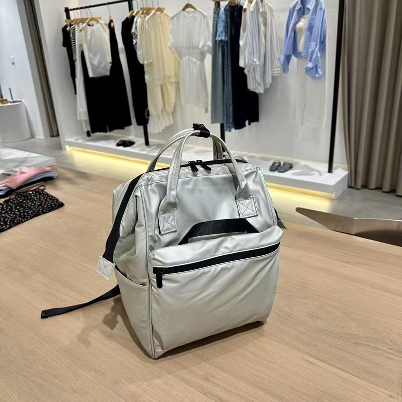 Značka módního návrháře Dámský a pánský batoh Trendy styl Taška na notebook 15,6 palce PU kůže Businessový ruksak Dámská školní taška
