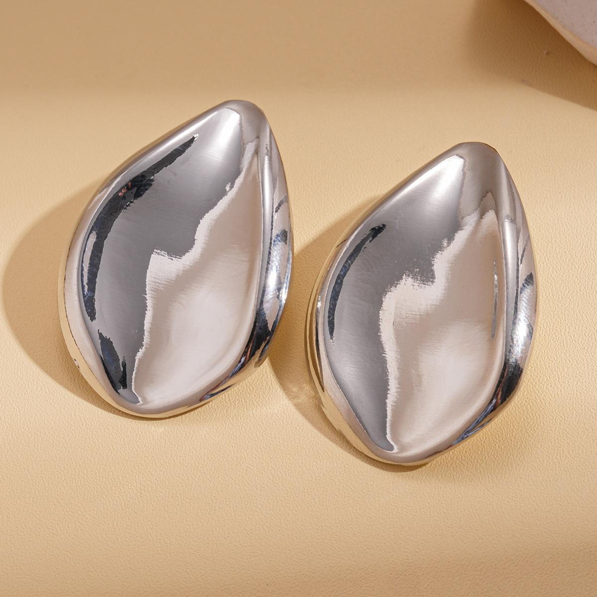 Гладкие неправильной формы серьги-гвоздики стальные с шипом простые серьги