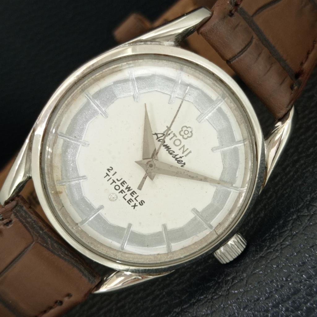 TITONI AIRMASTER TITOFLEX РУЧНОЙ ЗАВОД ВИНТАЖНЫЕ ШВЕЙЦАРСКИЕ МУЖСКИЕ БЕЛЫЕ ЧАСЫ a705120-1