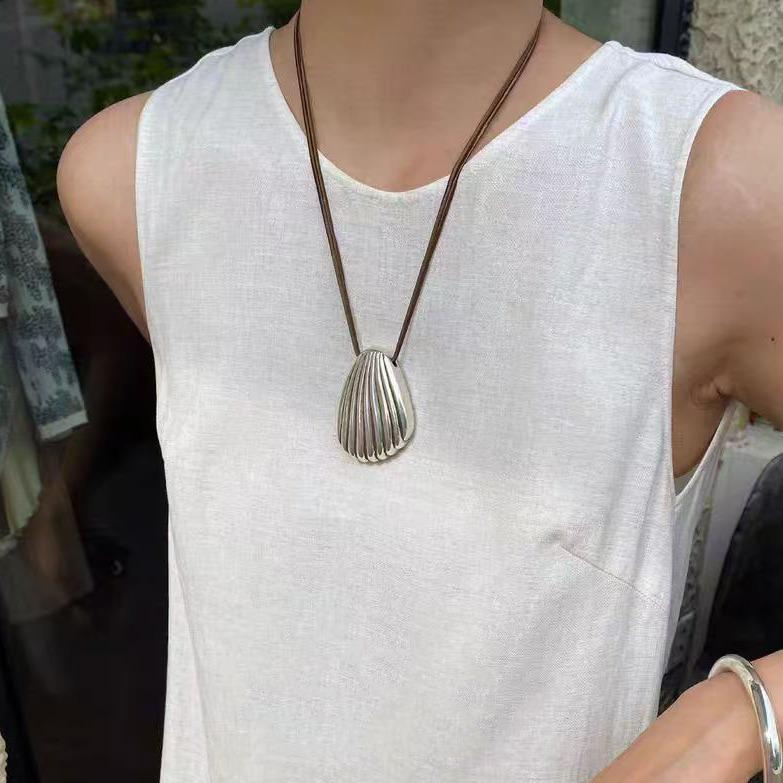 Heavy-Duty Minimalist Shell Pendant with Brown Leather Cord