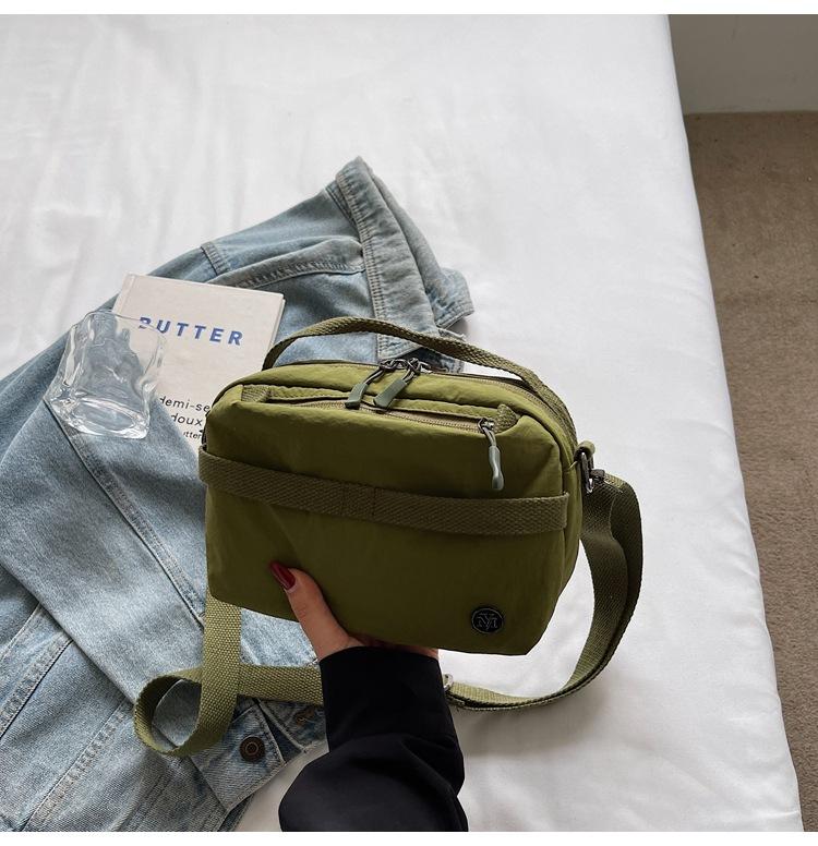 

Niche design lightweight canvas bag women s 2025 new Korean version casual outing handbag one-shoulder crossbody bag зелёный