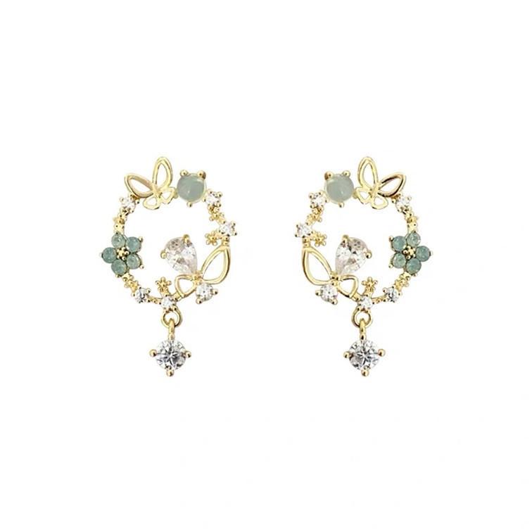 Silver Needle Korean Temperament Circle Butterfly Flower French Retro Hollow Earrings for Women Party Weddings .