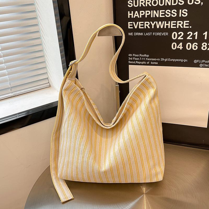 

Полосатая сумка женская летняя повседневная универсальная на плечо большой вместимости сумка-ведро для поездок жёлтый