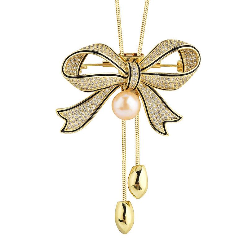 

Легкий, роскошный и нишевый аксессуар для одежды из двух частей. Модный и универсальный лук, длинное ожерелье с жемчужной кисточкой для женщин. 90cm