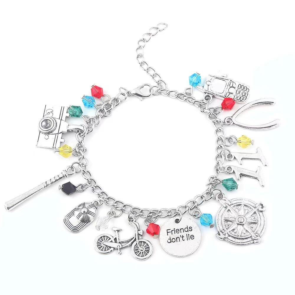 Stranger Things Christmas Bracelet: Vintage Axe, Bicycle & Cassette Charms