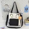 College style, large-capacity cat contrasting color, portable tote bag, girl commuter make-up bag, messenger bag, shoulder bag, school bag.