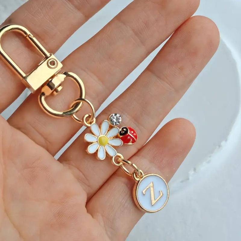 

1 шт. Семиточечная божья коровка Вечеринка Сделай сам Креативность Металлический дизайн Карабин Брелок Маркер 26 английских букв Подарок Z золотой/белый